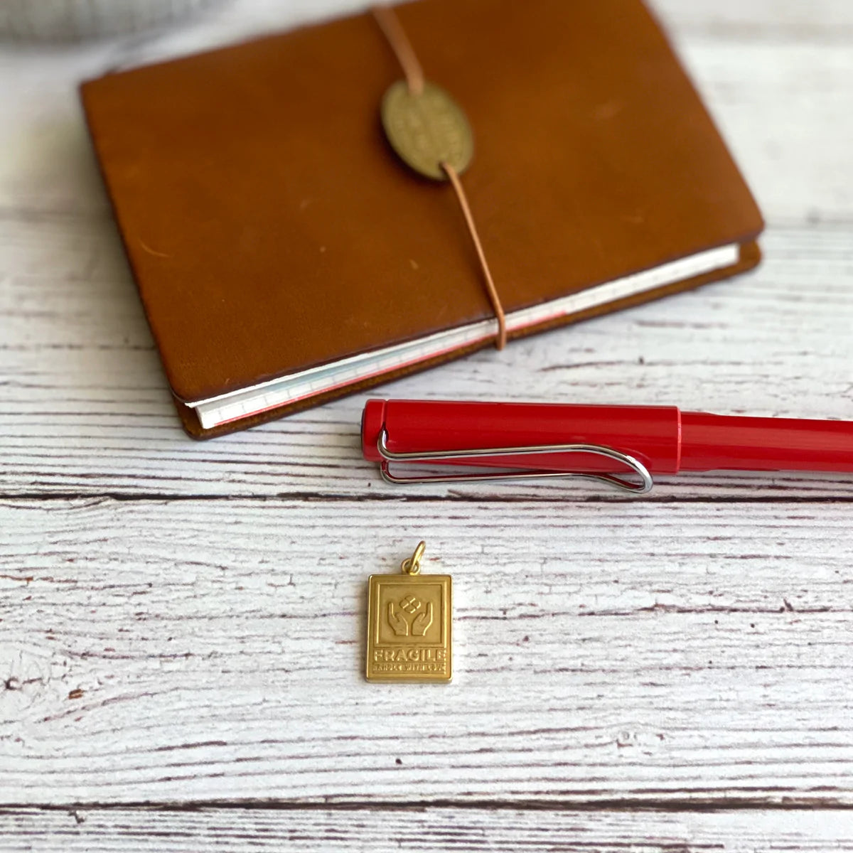 "Fragile" Brass Charm