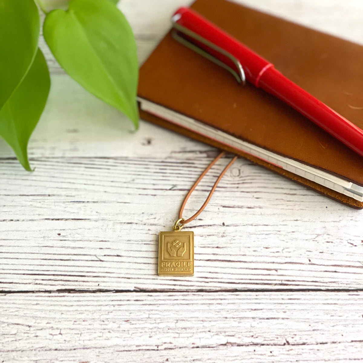 "Fragile" Brass Charm