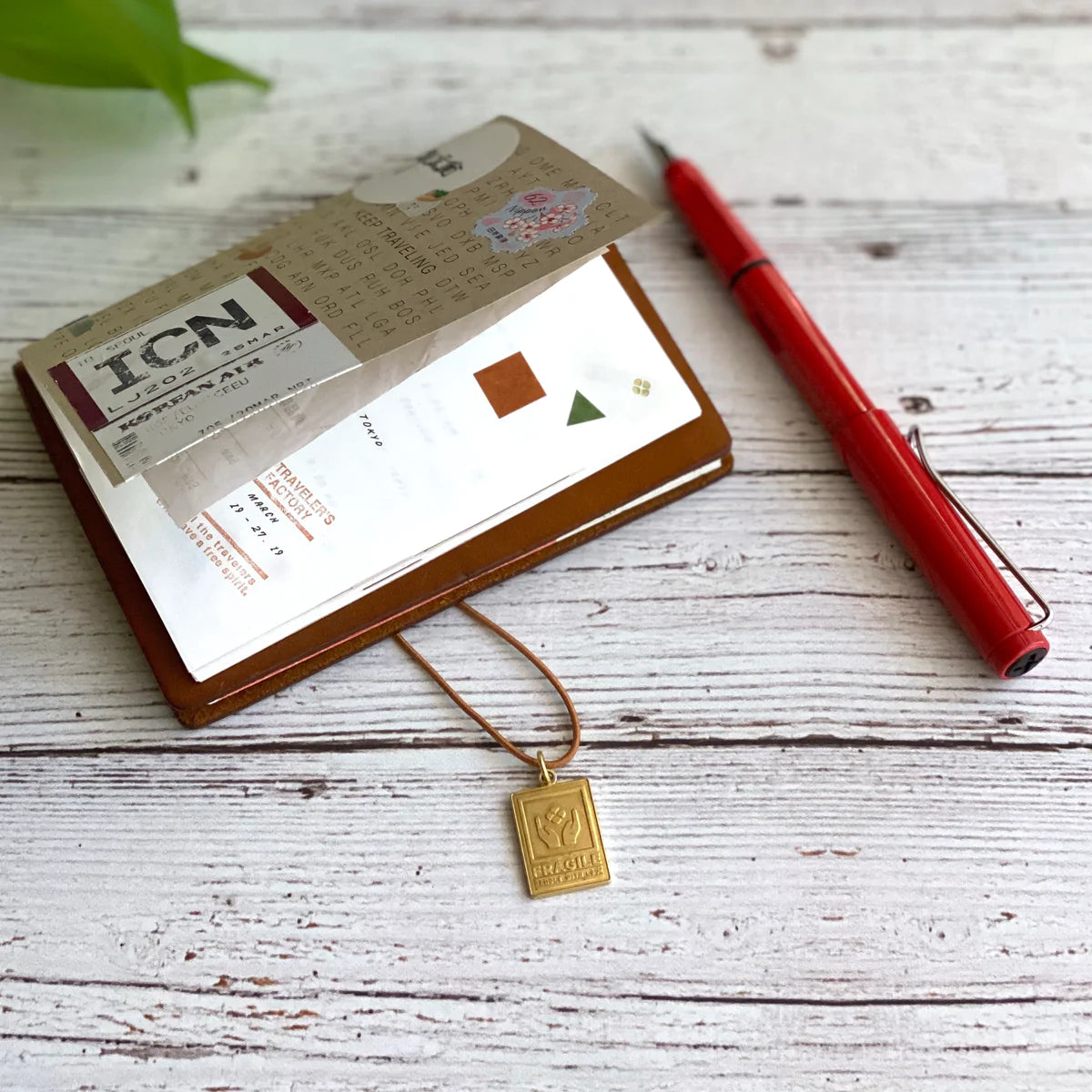 "Fragile" Brass Charm