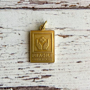 "Fragile" Brass Charm