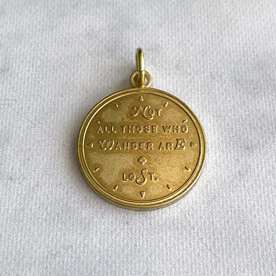 "Not All Those Who Wander are Lost" Brass Charm